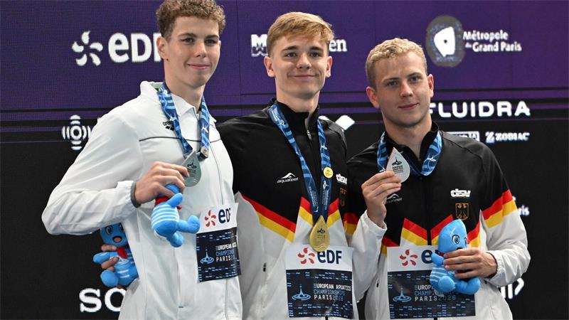 „Unglaubliches Rennen“: Liebmann feiert Gold und Weltrekord Zwei Deutsche freuen sich auf dem Podium.